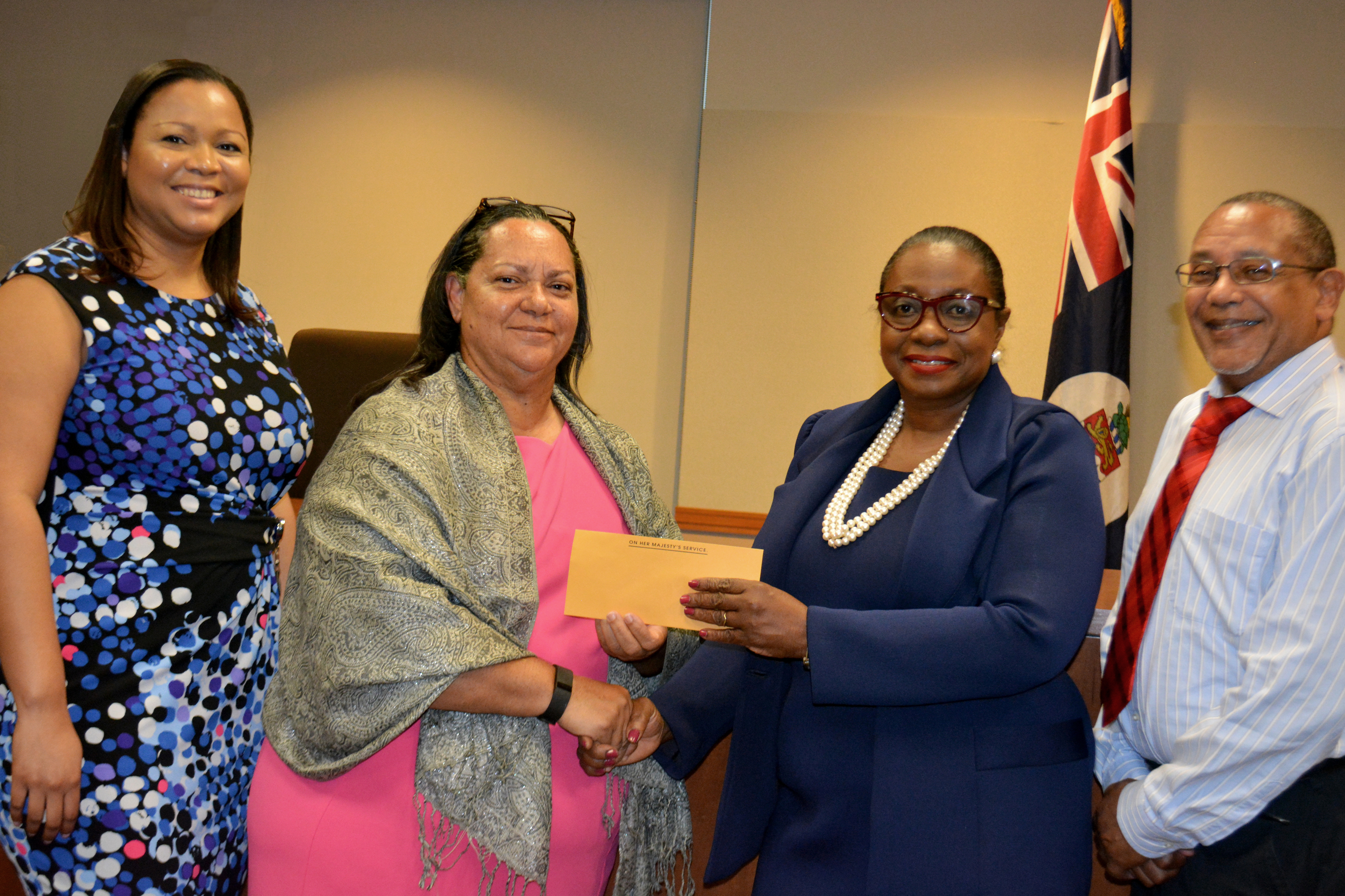 Ministry of Education UWI Cheque Presentation