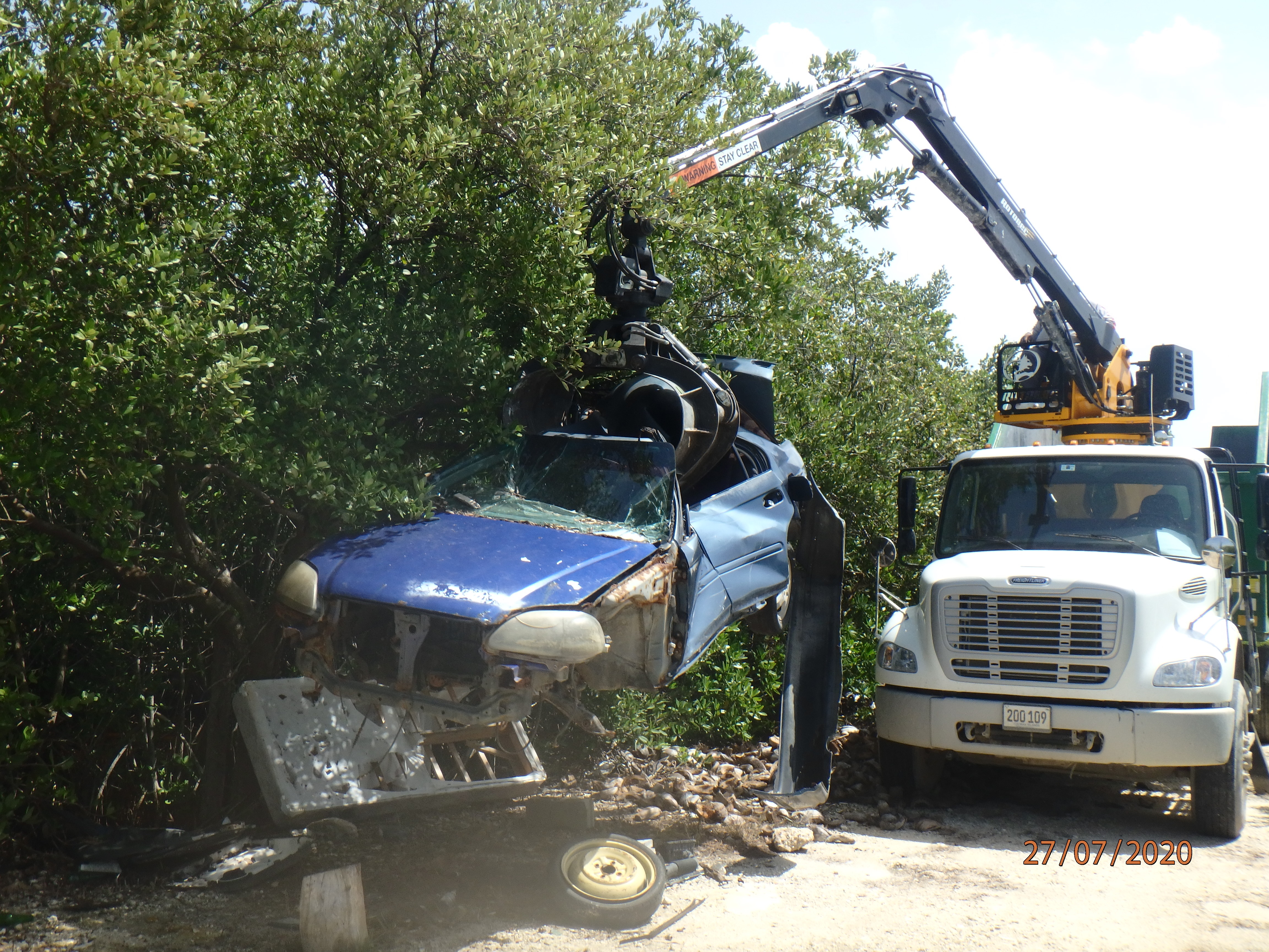Removal of Blue Derelict Car